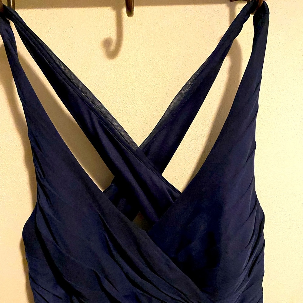 Navy Blue David’s bridal size 6 floor length dress. Never hemmed or adjusted.